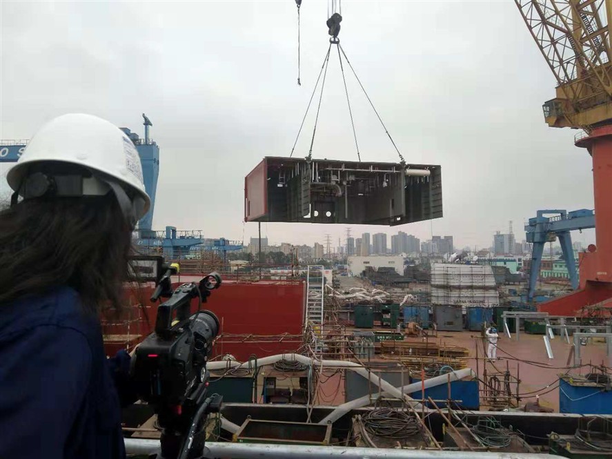 Chongqing production crew coordinating a local shoot